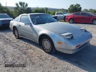 1987 Nissan 300ZX z VIN JN1HZ14S6HX214121, wystawiony jako IAAI lot #42204712 z przebiegiem 218 637 mil mil oraz . Historia ofert i sprzedaży dostępna na DreamBid. Obrazek 1.