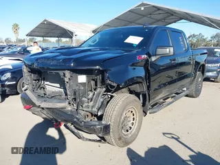 2024 Chevrolet Silverado 1500 Custom Trail Boss with VIN 3GCUDCE84RG129664, listed as a IAAI auction lot 41652172 with 35,644 mi miles. Bid and sale history available at carsss.com. Image 2.