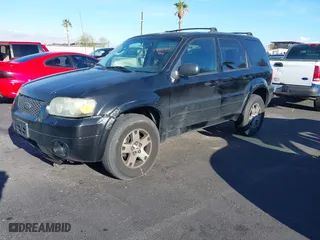 2005 Ford Escape Limited with VIN 1FMCU94165KE32639, listed as a IAAI auction lot 41960732 with 204,979 mi miles. Bid and sale history available at carsss.com. Image 6.