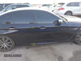 2017 BMW 5 Series 540i with VIN WBAJE5C38HG915154, listed as a IAAI auction lot 41572287 with 87,549 mi miles and . Bid and sale history available at carsss.com. Image 14.