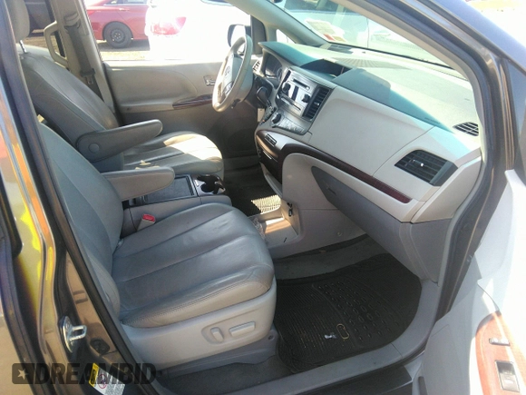 2014 Toyota Sienna XLE with VIN 5TDYK3DC2ES418860, listed as a IAAI auction lot 40139260 with 67,599 mi miles and . Bid and sale history available at DreamBid. Image 5.