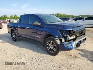 2020 Nissan Titan Platinum Reserve with VIN 1N6AA1EFXLN505021, listed as a Copart auction lot 65716805 with 64,624 mi miles and Salvage title. Bid and sale history available at DreamBid. Image 4.