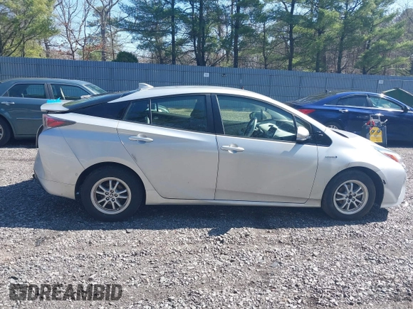 2018 Toyota Prius Two with VIN JTDKARFU5J3057086, listed as a IAAI auction lot 41910758 with 178,279 mi miles and . Bid and sale history available at DreamBid. Image 13.