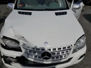 2010 Mercedes-Benz M 350 with VIN 4JGBB2FB0AA586441, listed as a Copart auction lot 49025215 with 144,977 mi miles and Salvage Title. Bid and sale history available at DreamBid. Image 12.