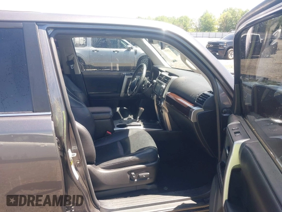 2015 Toyota 4Runner SR5 with VIN JTEZU5JR9F5094747, listed as a IAAI auction lot 42093528 with 230,958 mi miles and . Bid and sale history available at DreamBid. Image 5.
