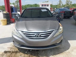 2014 Hyundai Sonata SE with VIN 5NPEC4AC4EH908832, listed as a IAAI auction lot 42099613 with 136,486 mi miles and . Bid and sale history available at DreamBid. Image 6.