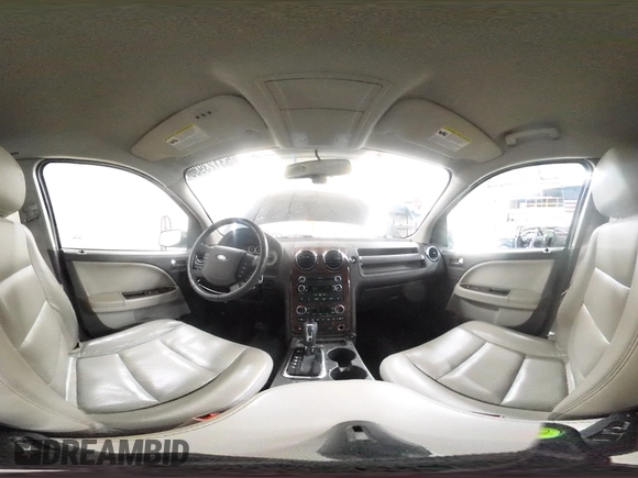 2008 Ford Taurus X Limited with VIN 1FMDK06W18GA03821, listed as a Copart auction lot 53123935 with 147,333 mi miles and Salvage title. Bid and sale history available at DreamBid. Image 14.
