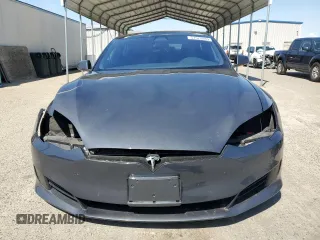 2016 Tesla Model S 90D with VIN 5YJSA1E22GF177120, listed as a Copart auction lot 51972885 with 73,441 mi miles and Salvage title. Bid and sale history available at DreamBid. Image 5.