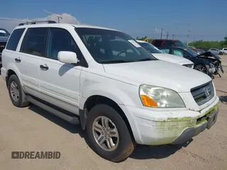 2003 Honda Pilot EX with VIN 2HKYF18583H537259, listed as a IAAI auction lot 42170726 with 319,752 mi miles and . Bid and sale history available at carsss.com. Image 1.