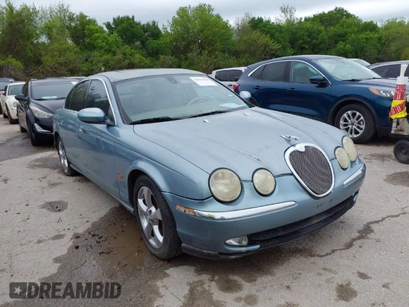 2003 Jaguar S-Type with VIN SAJEA01U33HM70079, listed as a IAAI auction lot 41939388 with 147,975 mi miles and . Bid and sale history available at DreamBid. Image 1.