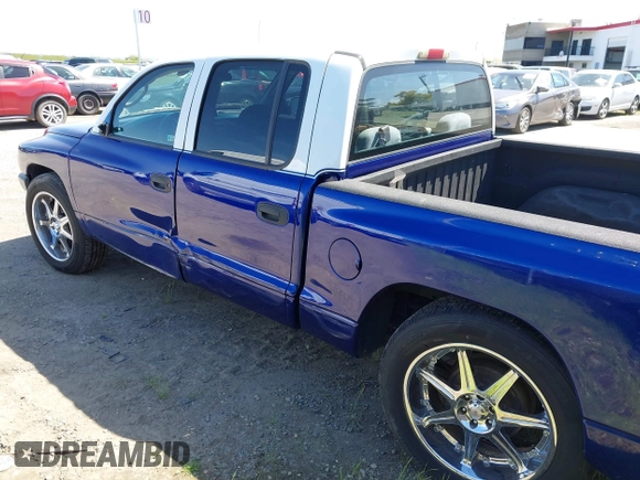 2001 Dodge Dakota Sport with VIN 1B7GL2AX91S137392, listed as a IAAI auction lot 41906615 with 169,808 mi miles and . Bid and sale history available at carsss.com. Image 3.