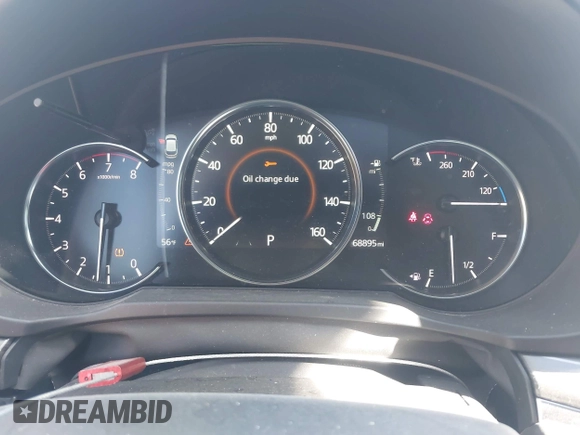 2020 Mazda CX-5 Grand Touring with VIN JM3KFBDM1L0821975, listed as a IAAI auction lot 40088794 with 68,895 mi miles and . Bid and sale history available at DreamBid. Image 7.
