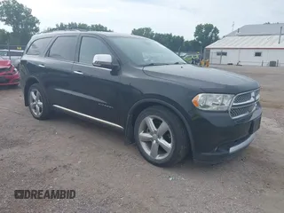 2013 Dodge Durango Citadel z VIN 1C4SDJET3DC563618, wystawiony jako IAAI lot #42828144 z przebiegiem 202 648 mil mil oraz . Historia ofert i sprzedaży dostępna na DreamBid. Obrazek 1.