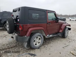 2008 Jeep Wrangler Sahara z VIN 1J4FA54128L561392, wystawiony jako Copart lot #50216865 z przebiegiem 183 825 mil mil oraz Czysty tytuł • Clean title. Historia ofert i sprzedaży dostępna na DreamBid. Obrazek 3.
