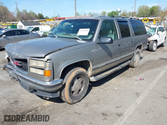 1999 GMC Suburban with VIN 3GKFK16R4XG514928, listed as a IAAI auction lot 41934636 with 245,010 mi miles and . Bid and sale history available at DreamBid. Image 2.