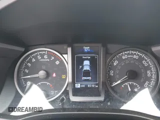 2021 Toyota Tacoma SR z VIN 3TMCZ5AN9MM397611, wystawiony jako IAAI lot #41467705 z przebiegiem 65 191 mil mil oraz . Historia ofert i sprzedaży dostępna na DreamBid. Obrazek 7.