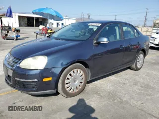 2009 Volkswagen Jetta S with VIN 3VWJZ71K19M009204, listed as a Copart auction lot 59012365 with 151,711 mi miles and Salvage title. Bid and sale history available at DreamBid. Image 1.