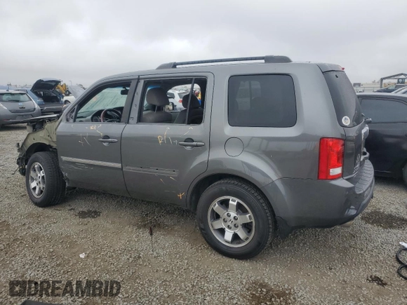 2011 Honda Pilot Touring z VIN 5FNYF4H94BB046303, wystawiony jako Copart lot #58017515 z przebiegiem 118 384 mil mil oraz Szkoda całkowita • Salvage title. Historia ofert i sprzedaży dostępna na DreamBid. Obrazek 2.