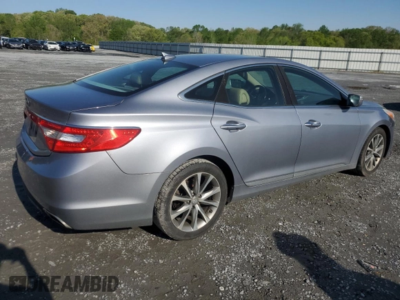 2015 Hyundai Azera z VIN KMHFG4JGXFA483472, wystawiony jako Copart lot #52216745 z przebiegiem 130 758 mil mil oraz Szkoda całkowita • Salvage title. Historia ofert i sprzedaży dostępna na DreamBid. Obrazek 3.