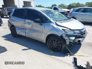 2020 Honda Fit LX z VIN 3HGGK5H48LM732408, wystawiony jako IAAI lot #42054658 z przebiegiem 101 117 mil mil oraz . Historia ofert i sprzedaży dostępna na DreamBid. Obrazek 1.