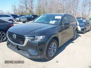 2024 Mazda CX-90 Preferred Plus with VIN JM3KKCHD7R1110327, listed as a IAAI auction lot 41711481 with 24,871 mi miles and . Bid and sale history available at DreamBid. Image 2.
