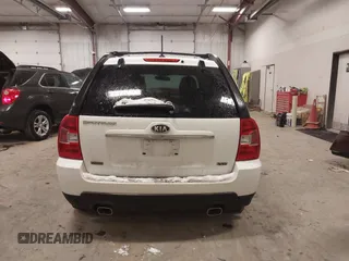 2010 Kia Sportage LX with VIN KNDKGCA35A7718764, listed as a IAAI auction lot 41512368 with 122,420 mi miles and . Bid and sale history available at carsss.com. Image 16.