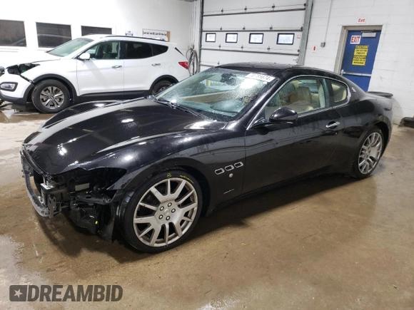 2009 Maserati GranTurismo с VIN ZAMGJ45A190042805, выставлен на аукционе Copart как лот 70785674 с пробегом 71 810 миль миль и Списание • Salvage title. История ставок и продаж доступна на DreamBid. Изображение 1.