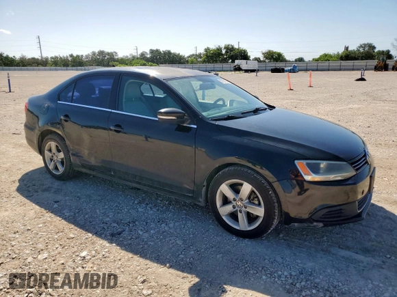 2013 Volkswagen Jetta TDI w/Premium z VIN 3VWLL7AJ7DM232096, wystawiony jako Copart lot #57265725 z przebiegiem 120 361 mil mil oraz Szkoda całkowita • Salvage title. Historia ofert i sprzedaży dostępna na DreamBid. Obrazek 4.