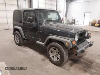 2006 Jeep Wrangler Sport Right Hand Drive with VIN 1J4F449S56P741328, listed as a IAAI auction lot 41476847 with 67,203 mi miles. Bid and sale history available at carsss.com. Image 1.