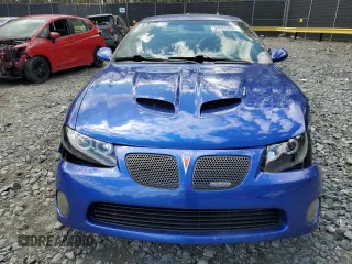 2005 Pontiac GTO z VIN 6G2VX12U55L432796, wystawiony jako Copart lot #53055995 z przebiegiem 147 253 mil mil oraz Szkody całkowita. Historia ofert i sprzedaży dostępna na DreamBid. Obrazek 5.