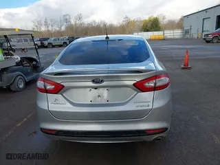 2015 Ford Fusion Titanium Hybrid with VIN 3FA6P0RU8FR181312, listed as a IAAI auction lot 42071584 with 99,955 mi miles. Bid and sale history available at carsss.com. Image 16.