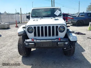 2021 Jeep Wrangler Unlimited Rubicon with VIN 1C4HJXFN9MW519496, listed as a IAAI auction lot 41676845 with 72,767 mi miles. Bid and sale history available at carsss.com. Image 12.