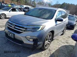 2017 Honda Pilot Touring with VIN 5FNYF6H94HB006873, listed as a IAAI auction lot 41618529 with 154,689 mi miles. Bid and sale history available at carsss.com. Image 2.