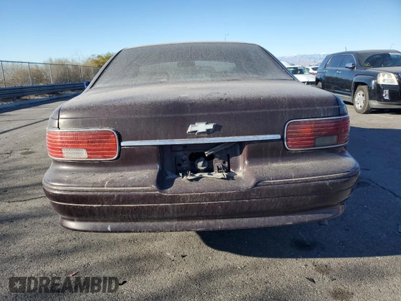 1996 Chevrolet Caprice 1SA Special Value z VIN 1G1BL52W9TR122492, wystawiony jako Copart lot #83251184 z przebiegiem 190 358 mil mil oraz Czysty tytuł • Clean title. Historia ofert i sprzedaży dostępna na DreamBid. Obrazek 6.