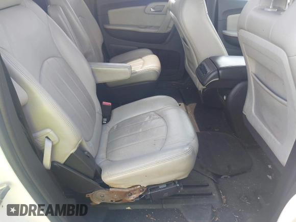 2011 Chevrolet Traverse LTZ with VIN 1GNKVLED5BJ167465, listed as a IAAI auction lot 42002979 with 167,271 mi miles and . Bid and sale history available at DreamBid. Image 8.