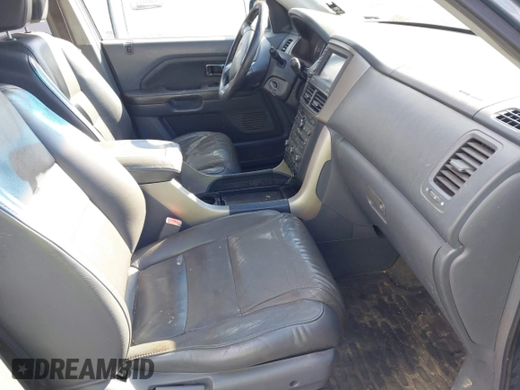 2006 Honda Pilot EX-L with VIN 2HKYF18716H535598, listed as a IAAI auction lot 41676797 with 212,130 mi miles and . Bid and sale history available at DreamBid. Image 5.