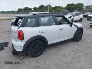 2015 MINI Countryman S z VIN WMWZC3C5XFWP53190, wystawiony jako IAAI lot #41273123 z przebiegiem 163 658 mil mil oraz . Historia ofert i sprzedaży dostępna na DreamBid. Obrazek 4.