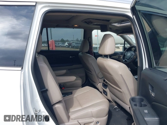 2017 Honda Pilot Elite with VIN 5FNYF6H04HB042192, listed as a IAAI auction lot 41780875 with 158,491 mi miles and . Bid and sale history available at DreamBid. Image 8.