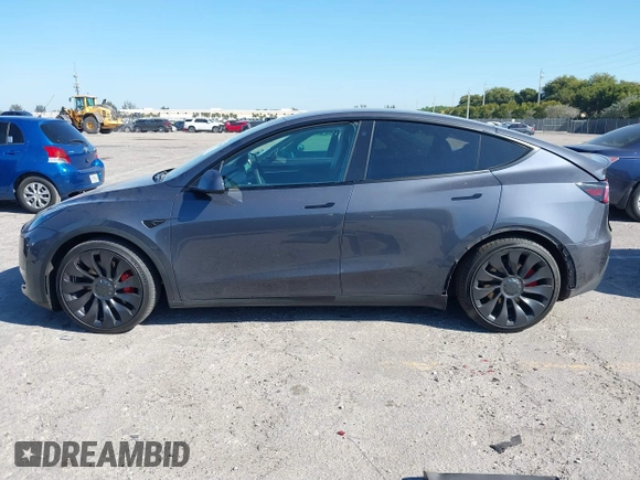 2022 Tesla Model Y Performance with VIN 7SAYGDEF6NF540094, listed as a IAAI auction lot 41786865 with 28,356 mi miles and . Bid and sale history available at DreamBid. Image 14.