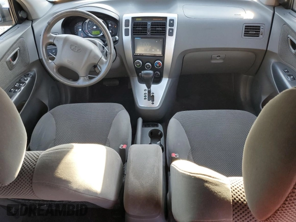 2007 Hyundai Tucson SE with VIN KM8JN12D67U637520, listed as a Copart auction lot 72886354 with 111,736 mi miles and Salvage Title. Bid and sale history available at carsss.com. Image 8.