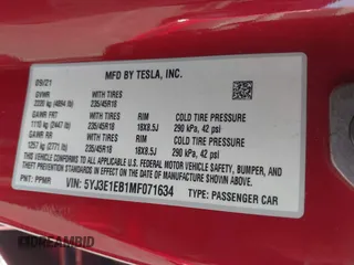 2021 Tesla Model 3 Long Range with VIN 5YJ3E1EB1MF071634, listed as a IAAI auction lot 41964321 with 39,596 mi miles. Bid and sale history available at carsss.com. Image 9.