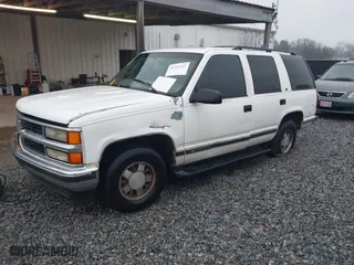 1999 Chevrolet Tahoe with VIN 1GNEC13RXXR101766, listed as a IAAI auction lot 41393447 with 387,448 mi miles. Bid and sale history available at carsss.com. Image 2.