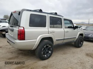 2009 Jeep Commander Sport z VIN 1J8HH48K79C519351, wystawiony jako Copart lot #44996585 z przebiegiem 153 891 mil mil oraz Czysty tytuł • Clean title. Historia ofert i sprzedaży dostępna na DreamBid. Obrazek 3.