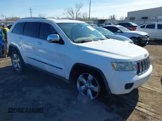 2013 Jeep Grand Cherokee Overland with VIN 1C4RJECT4DC526160, listed as a IAAI auction lot 41429164 with 115,311 mi miles. Bid and sale history available at carsss.com. Image 1.