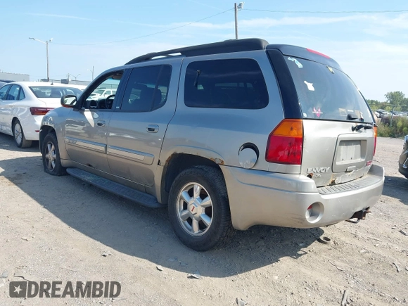 2003 GMC Envoy SLT with VIN 1GKES16S336101568, listed as a IAAI auction lot 40187998 with 185,402 mi miles. Bid and sale history available at carsss.com. Image 3.