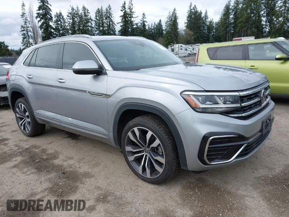 2021 Volkswagen Atlas SEL with VIN 1V2SE2CA4MC229844, listed as a IAAI auction lot 41916623 with 34,618 mi miles and . Bid and sale history available at DreamBid. Image 1.