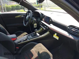 2024 Dodge Hornet GT Plus with VIN ZACNDFAN1R3A13510, listed as a IAAI auction lot 42434612 with 9,867 mi miles and . Bid and sale history available at DreamBid. Image 5.