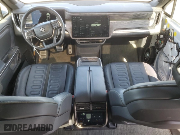 2022 Rivian R1T Launch Edition with VIN 7FCTGAAL7NN005563, listed as a Copart auction lot 47476365 with 39,805 mi miles and Salvage Title. Bid and sale history available at DreamBid. Image 8.