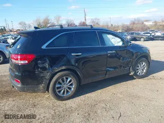 2016 Kia Sorento LX with VIN 5XYPGDA54GG019084, listed as a IAAI auction lot 40985459 with 148,743 mi miles. Bid and sale history available at carsss.com. Image 4.