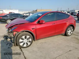 2023 Tesla Model Y Long Range z VIN 7SAYGDEE8PA138780, wystawiony jako Copart lot #53294385 z przebiegiem 137 496 mil mil oraz Szkody całkowita. Historia ofert i sprzedaży dostępna na DreamBid. Obrazek 1.